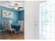 Inviting dining area featuring a table with seating for eight and stylish light fixture at 26822 Bull Run, Leesburg, FL 34748