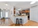 Open kitchen features granite countertops and stainless steel appliances for a modern look at 26822 Bull Run, Leesburg, FL 34748