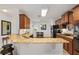 Bright kitchen showcases granite countertops, modern appliances, and a breakfast nook at 26822 Bull Run, Leesburg, FL 34748