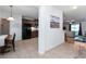 Open-concept home featuring tiled flooring, breakfast nook, dark cabinetry and stainless steel appliances at 26822 Bull Run, Leesburg, FL 34748