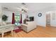 Inviting living room with hardwood floors, comfortable seating, and natural light at 26822 Bull Run, Leesburg, FL 34748