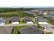 An aerial view of the homes in a quiet, suburban neighborhood at 2988 Sentell St, The Villages, FL 32163