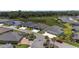 An aerial view of a neighborhood featuring many homes at 2988 Sentell St, The Villages, FL 32163