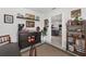 Office area features custom coffee bar, decorative accents and view into living area at 2988 Sentell St, The Villages, FL 32163