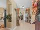 Welcoming entryway with tiled floors, decorative niches, and stylish furnishings at 2998 Kramer Ct, The Villages, FL 32163