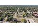 Overhead view of neighborhood with mature trees, houses and paved streets at 30 E Key Ave, Eustis, FL 32726