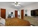 Spacious bedroom offers comfortable furnishings, stylish decor, and ample natural light at 30 E Key Ave, Eustis, FL 32726