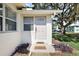 Inviting front entrance with a well-maintained doorstep at 30 E Key Ave, Eustis, FL 32726