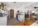 Modern kitchen with white cabinetry and stainless steel appliances at 30 E Key Ave, Eustis, FL 32726