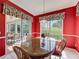 Sun-lit breakfast nook with backyard views and access to the lanai at 3559 Chapel Hill Blvd, Clermont, FL 34711