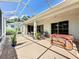 Enclosed patio with hot tub and patio furniture at 3559 Chapel Hill Blvd, Clermont, FL 34711