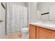 Cozy bathroom with a vanity, toilet, and shower/tub combination, perfect for relaxation and convenience at 4716 Block Island Ln, Clermont, FL 34714