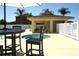 Relaxing community hot tub with comfortable seating and spa rules posted nearby at 4716 Block Island Ln, Clermont, FL 34714