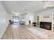 Bright and airy living room with hardwood floors, neutral paint, and lots of natural light at 4716 Block Island Ln, Clermont, FL 34714