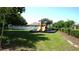 Community playground area with colorful slides, climbing structures, and safety surfacing at 4716 Block Island Ln, Clermont, FL 34714