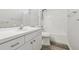 Bathroom featuring a white vanity, toilet, and shower/tub at 508 Woodview Dr, Tavares, FL 32778