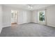 Large bedroom with ensuite bathroom, walk-in closet, and view at 508 Woodview Dr, Tavares, FL 32778