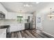 Bright kitchen featuring stainless steel appliances, ample counter space, and open sight lines at 508 Woodview Dr, Tavares, FL 32778