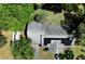 Birds eye view of a house rooftop featuring solar panels at 513 Barwick St, Wildwood, FL 34785