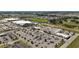 Aerial view showcasing the convenient access to commercial and residential areas at 5333 Loblolly Ln, Wildwood, FL 34785