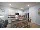 Well-equipped kitchen featuring stainless steel appliances, granite countertops, and ample cabinet space at 5333 Loblolly Ln, Wildwood, FL 34785