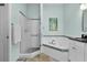 Bright bathroom featuring a glass door shower, soaking tub, and modern fixtures at 541 Carrera Dr, The Villages, FL 32159