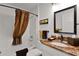 Bathroom featuring a shower with a curtain, a toilet, and a sink with a vanity at 541 Carrera Dr, The Villages, FL 32159
