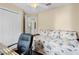 Comfortable bedroom with a closet and views into other rooms of the house at 541 Carrera Dr, The Villages, FL 32159