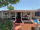 Covered porch perfect for enjoying the outdoors and relaxing at 603 W Seminole Ave, Eustis, FL 32726