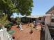 Backyard featuring mature trees, landscaping, and room for relaxing and entertaining at 603 W Seminole Ave, Eustis, FL 32726