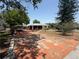 Charming single-story home featuring a large driveway, carport, and well-maintained landscaping at 603 W Seminole Ave, Eustis, FL 32726