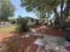 Home exterior with large trees and ample yard space at 603 W Seminole Ave, Eustis, FL 32726