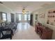Spacious living room showcasing tile flooring, open layout, and natural light at 603 W Seminole Ave, Eustis, FL 32726