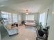 Comfortable living room filled with natural light, featuring a neutral color palette at 603 W Seminole Ave, Eustis, FL 32726