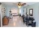 Open living space featuring tile floors, comfortable seating and ceiling fan at 603 W Seminole Ave, Eustis, FL 32726