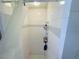 This is a clean shower with tiled walls and a shower curtain at 603 W Seminole Ave, Eustis, FL 32726