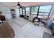 Large sunroom featuring many windows and plenty of space for entertaining at 603 W Seminole Ave, Eustis, FL 32726