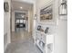 Inviting entryway with tile flooring and tasteful decor at 6042 Claystone Way, Mount Dora, FL 32757