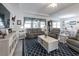 The living room boasts lots of natural light and an open layout, creating a comfortable atmosphere at 6042 Claystone Way, Mount Dora, FL 32757