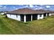 Expansive backyard with screened lanai, ideal for outdoor entertaining and relaxation at 6203 Sw 93Rd Loop, Ocala, FL 34476