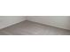 Bedroom featuring neutral walls and carpeted floors with white baseboards throughout at 6203 Sw 93Rd Loop, Ocala, FL 34476