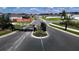 Gated community entrance with well-maintained landscaping and clear street signage at 6203 Sw 93Rd Loop, Ocala, FL 34476