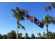 Community flagpole features the American flag, and US Navy flag at 6203 Sw 93Rd Loop, Ocala, FL 34476