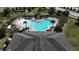 Aerial view of community pool and seating area at 6203 Sw 93Rd Loop, Ocala, FL 34476