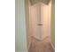 View of bi-fold doors offering a clean and space-saving design in a carpeted hallway at 6203 Sw 93Rd Loop, Ocala, FL 34476