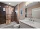 Bathroom featuring a bathtub, shower, and a large vanity with a white countertop at 6243 Danielson Loop, The Villages, FL 32163