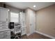 Functional home office featuring custom cabinetry, built-in desk, and neutral finishes at 6243 Danielson Loop, The Villages, FL 32163