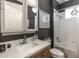 Chic bathroom with modern vanity, bathtub, stylish fixtures, and neutral color scheme at 7873 Crosswinds Way, Mount Dora, FL 32757