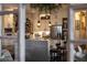 Bright kitchen with a center island featuring white cabinets and stainless steel appliances at 7873 Crosswinds Way, Mount Dora, FL 32757