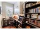 Well-organized office featuring built-in storage, ample workspace, and stylish shelving at 7873 Crosswinds Way, Mount Dora, FL 32757